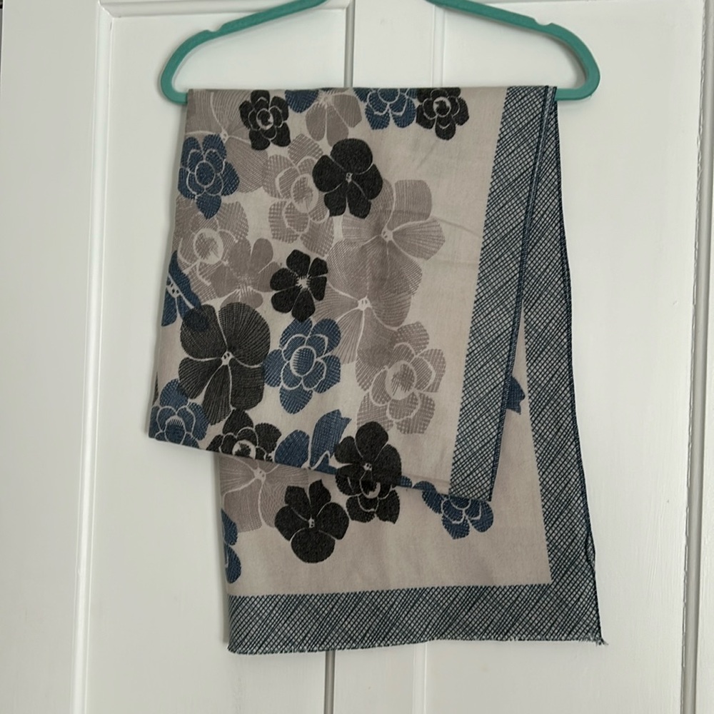 A lovely cachet of shawls & scarfs.